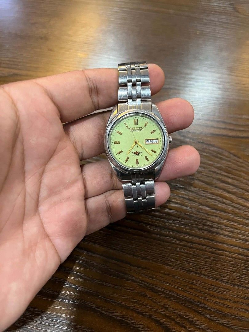 Citizen Automatic Watch - Day/Date (Category: Men's Watches) located in Cebu City. Submitted by jbok_watches. (Listing ID 1463260316, Image 2). Description: - Citizen Automatic Watch - Day and Date Complication - Stainless Steel Case and Band - Unique Light Green/Yellow Dial - Exhibition Case Back (Visible Movement) - Ready for its new home!.