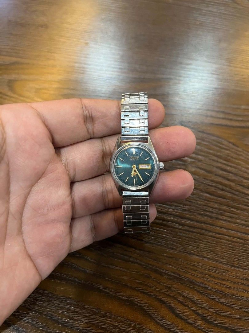 Citizen Automatic Watch Green Dial Day Date (Category: Men's Watches) located in Cebu City. Submitted by jbok_watches. (Listing ID 1463261176, Image 1). Description: - Vintage Citizen Automatic Watch - Striking Green Dial - Day and Date Complication - Durable Stainless Steel Bracelet - Excellent Running Condition - Perfect for Watch Collectors or Everyday Wear - Sold As Is.