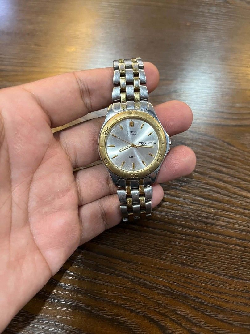Citizen Quartz Two-Tone Watch WR 100 (Category: Men's Watches) located in Cebu City. Submitted by jbok_watches. (Listing ID 1463260552, Image 2). Description: - Citizen Quartz Watch - Two-tone stainless steel band - Day and date function - Water resistant up to 100 meters - Band has some signs of wear - Watch face is clean - Perfect everyday watch.