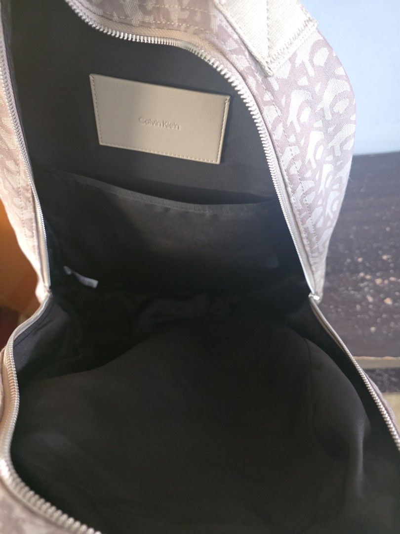 Ck monogram canvass backpack (Category: Backpacks) located in Manila. Submitted by meriux2026 (Listing ID 1463324607, Image 2). Description: worn 2xs bought in US ck outlet Paco manila.