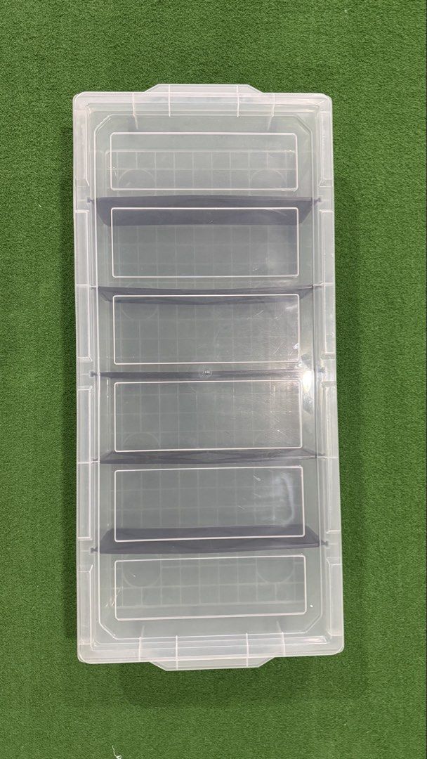 Clear Plastic Storage Box with 5 Compartments (Category: Storage Boxes & Baskets) located in Manila. Submitted by mysticstar_d67ad3_tree (Listing ID 1463180580, Image 1). Description: Used only for neckties. That’s it! *FYI. There’s a 6 inch crack on the side of the cover. This does not prevent the item from being used. - 840×380×140mm - Clear, stackable plastic storage box - 5 removable dividers for customizable compartments - Ideal for organizi
