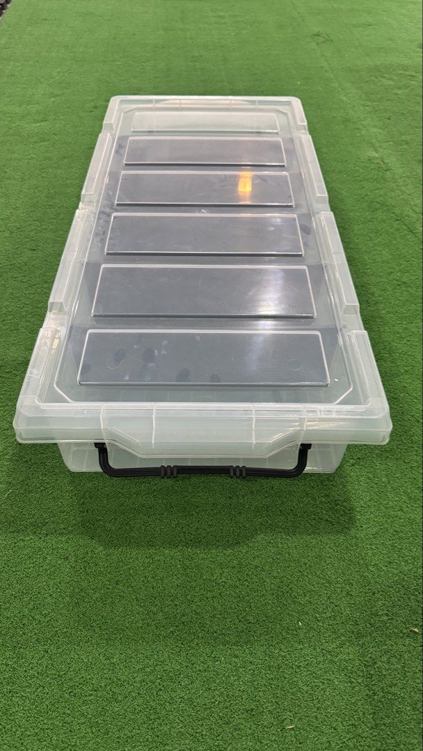 Clear Plastic Storage Box with 5 Compartments (Category: Storage Boxes & Baskets) located in Manila. Submitted by mysticstar_d67ad3_tree (Listing ID 1463180580, Image 2). Description: Used only for neckties. That’s it! *FYI. There’s a 6 inch crack on the side of the cover. This does not prevent the item from being used. - 840×380×140mm - Clear, stackable plastic storage box - 5 removable dividers for customizable compartments - Ideal for organizi