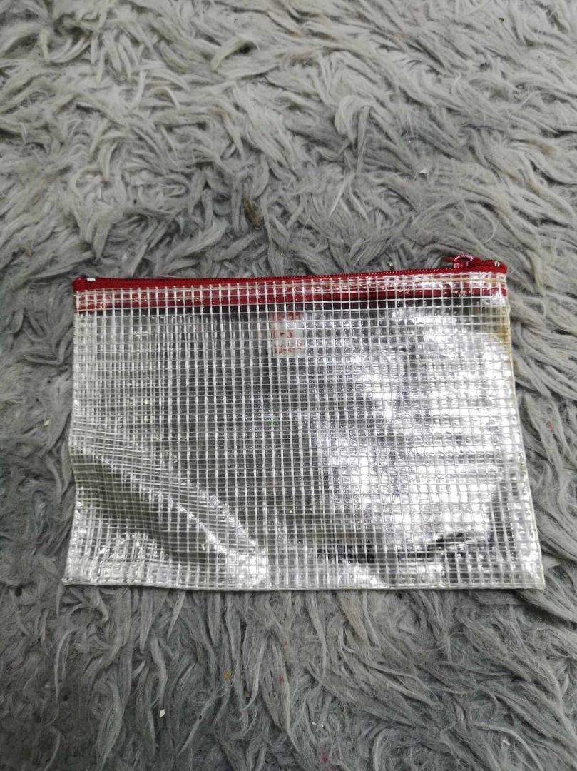 Clear PVC Mesh Zipper Pouch (Category: Stationery & School Supplies) located in Santa Cruz. Submitted by jmy_surplus.2 (Listing ID 1463125247, Image 1). Description: Size ; L - 5 W - 6.6 Color ; Red , White Type ; Pouch Brand ; No brand Material ; PVC Style ; Red Trim Zipper Pouch LR 129 JMY 3 Batch #223.