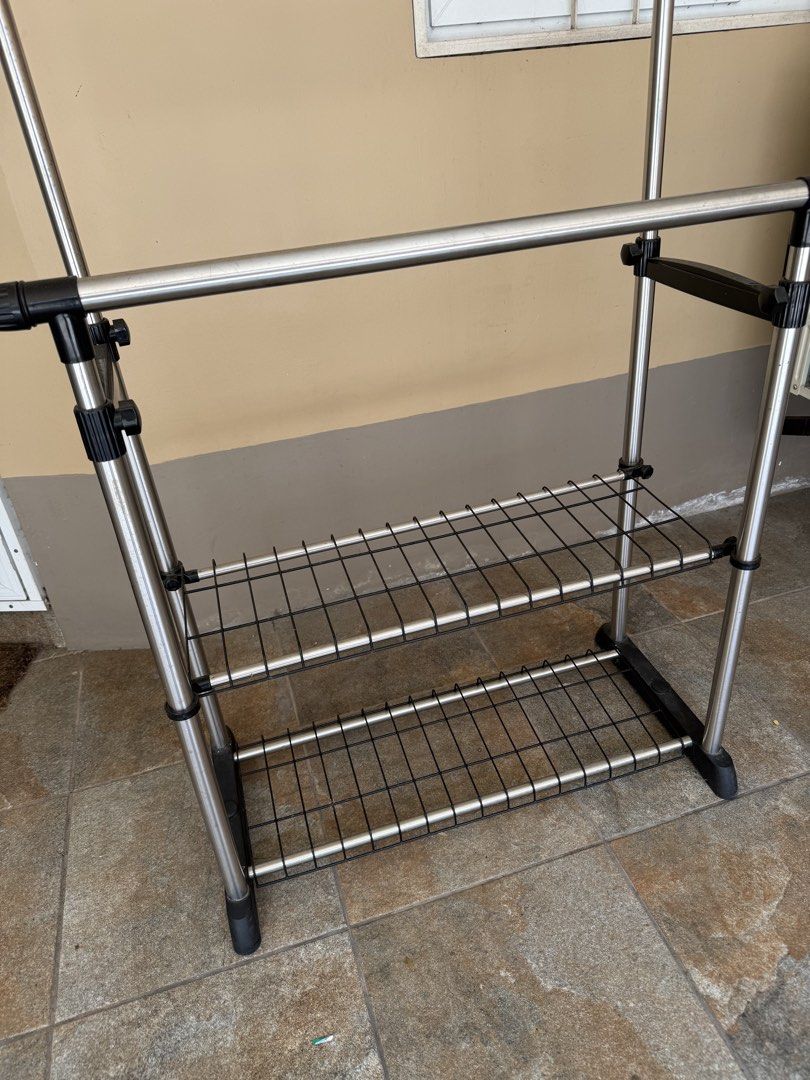 Adjustable Double Pole Clothes Rack (Category: Hooks & Hangers) located in Marikina City. Submitted by cluttermatters (Listing ID 1463242790, Image 2). Description: RFS: My mom has migrated to Australia, so we’re currently selling most of her household belongings..