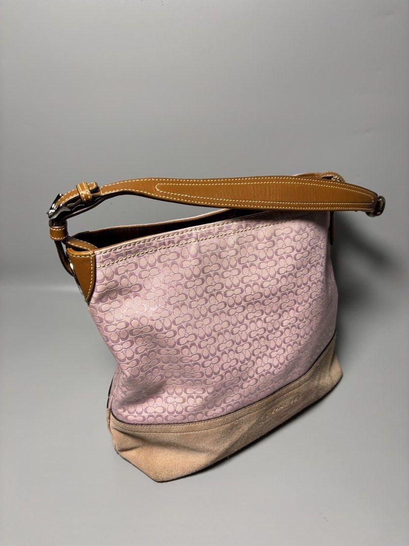 COACH Bucket Hobo Shoulder Bag (Category: Luxury Bags & Wallets) located in Manila. Submitted by jjeannyx (Listing ID 1463269646, Image 2). Description: - Medium to Large size - bought from japan - personal used - with hangtag - suede issue need clean & slightly fade bottom part bc of sign of usage - canvas, leather handle, inside are excellent condition no issue.