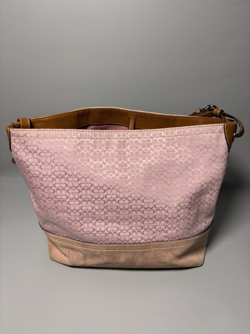 COACH Bucket Hobo Shoulder Bag (Category: Luxury Bags & Wallets) located in Manila. Submitted by jjeannyx (Listing ID 1463269646, Image 3). Description: - Medium to Large size - bought from japan - personal used - with hangtag - suede issue need clean & slightly fade bottom part bc of sign of usage - canvas, leather handle, inside are excellent condition no issue.