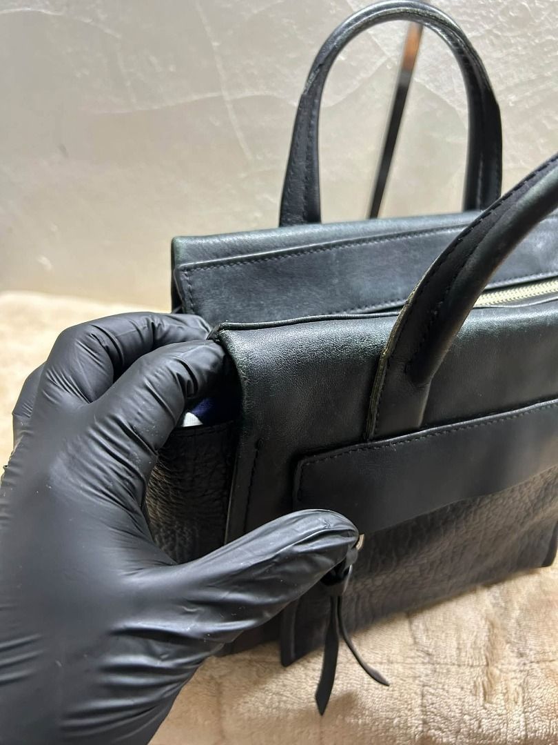 COACH MINI RILEY CARRY ALL (Category: Tote Bags) located in Caloocan City. Submitted by j3ngsanity (Listing ID 1463258767, Image 3). Description: AUTHENTIC ISSUE : LEATHER SCRATCHES / DISCOLORATION SA LOOB / MISSING SLING / MIN PAINT STAIN.