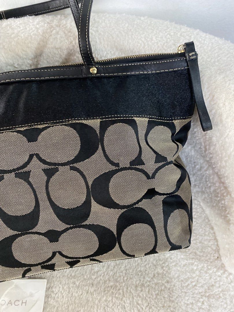 Coach Monogram Canvas Tote Bag (Category: Luxury Bags & Wallets) located in Bulacan. Submitted by red.basket24 (Listing ID 1463252149, Image 3). Description: ❣️AVAILABLE❣️CCH Signature Stripe Tote Bag 🏷️Mine: 3,290 php 📌Size: Medium 📌Condition: Lightly Used- Flaws, if any is barely noticeable 🌸YKK Zip 🌸Present Creed and Hangtag 🌸Gold hardwares 🌸No runs/rubs 🌸No peel off/cracks on leather 🌸Working Zipper Flaw/s: ‼️dirt on exterior canvas 