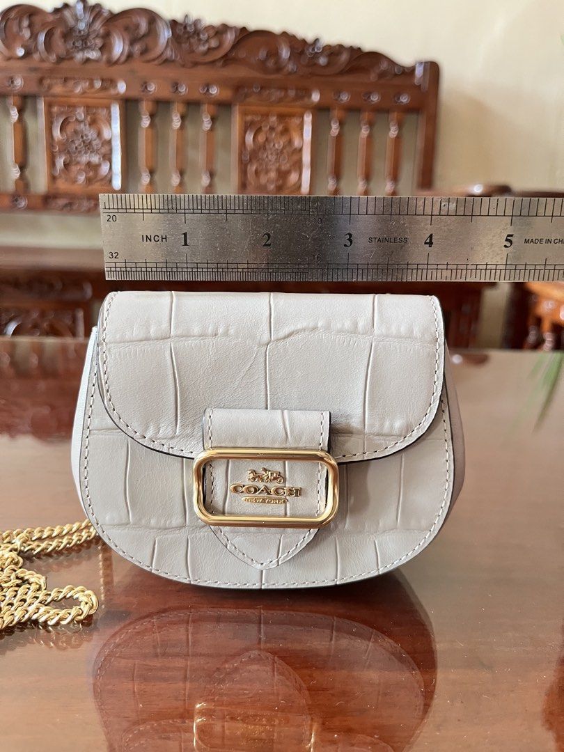 Coach Morgan Card Case on Chain in Grey (Category: Luxury Bags & Wallets) located in Dinalupihan. Submitted by penaflorcj (Listing ID 1463142527, Image 3). Description: - Authentic Coach - Croc embossed texture - Elegant gold chain strap - Coach New York logo on buckle - Compact size, ideal for cards and small essentials. - Perfect for evenings out or light travel. - Approximately 4 inches wide. - Can send a video rfs: decluttering *price is nego