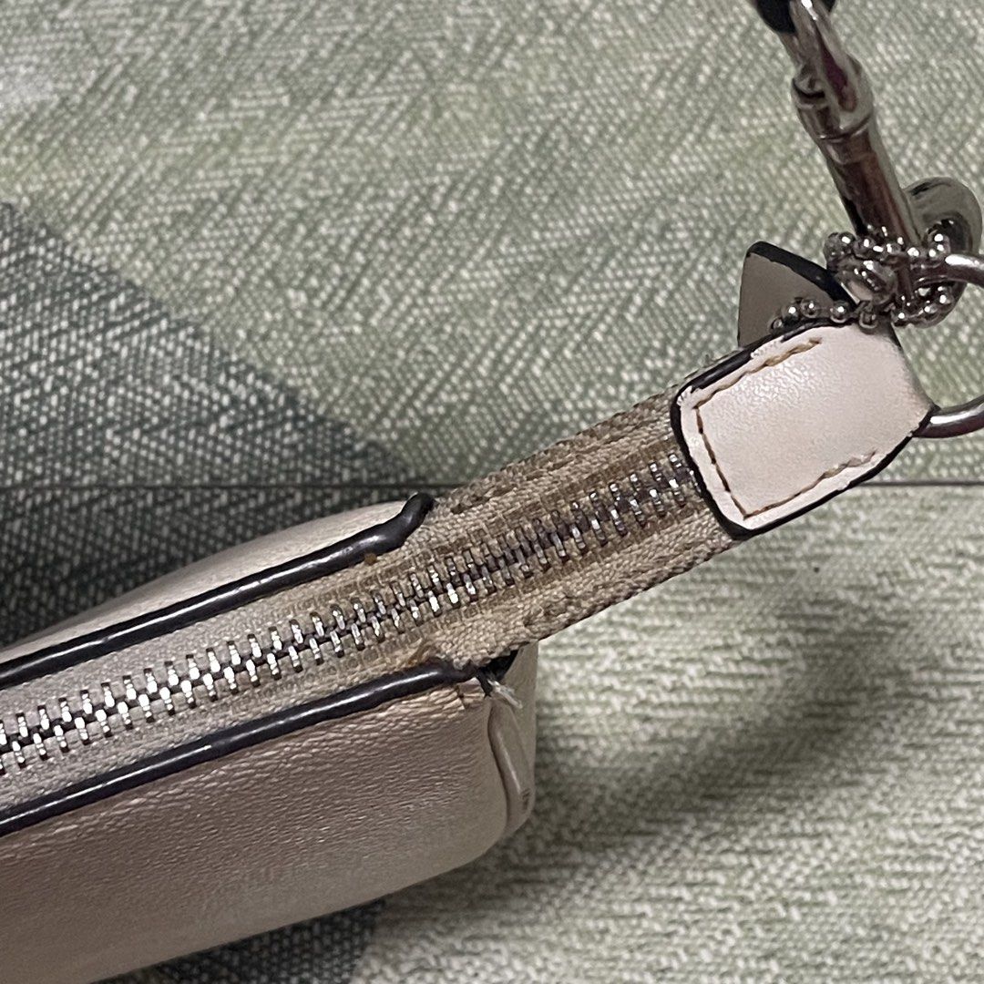 Coach Nolita 19 (Category: Shoulder Bags) located in Pasig City. Submitted by sirendiva_ (Listing ID 1463325497, Image 3). Description: - yellowed bag - zippers need adjustment to zipped fully - black ink marks inside the bag.