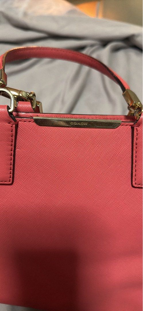 Coach Pink Leather Tote Bag (Category: Luxury Bags & Wallets) located in Cebu City. Submitted by eynjlin (Listing ID 1463287062, Image 2). Description: - Authentic Coach pink leather tote bag - Elegant gold hardware accents - Comfortable top handles - Includes a detachable strap for versatile wear - Interior zippered pockets for secure storage - Spacious design, ideal for everyday use.