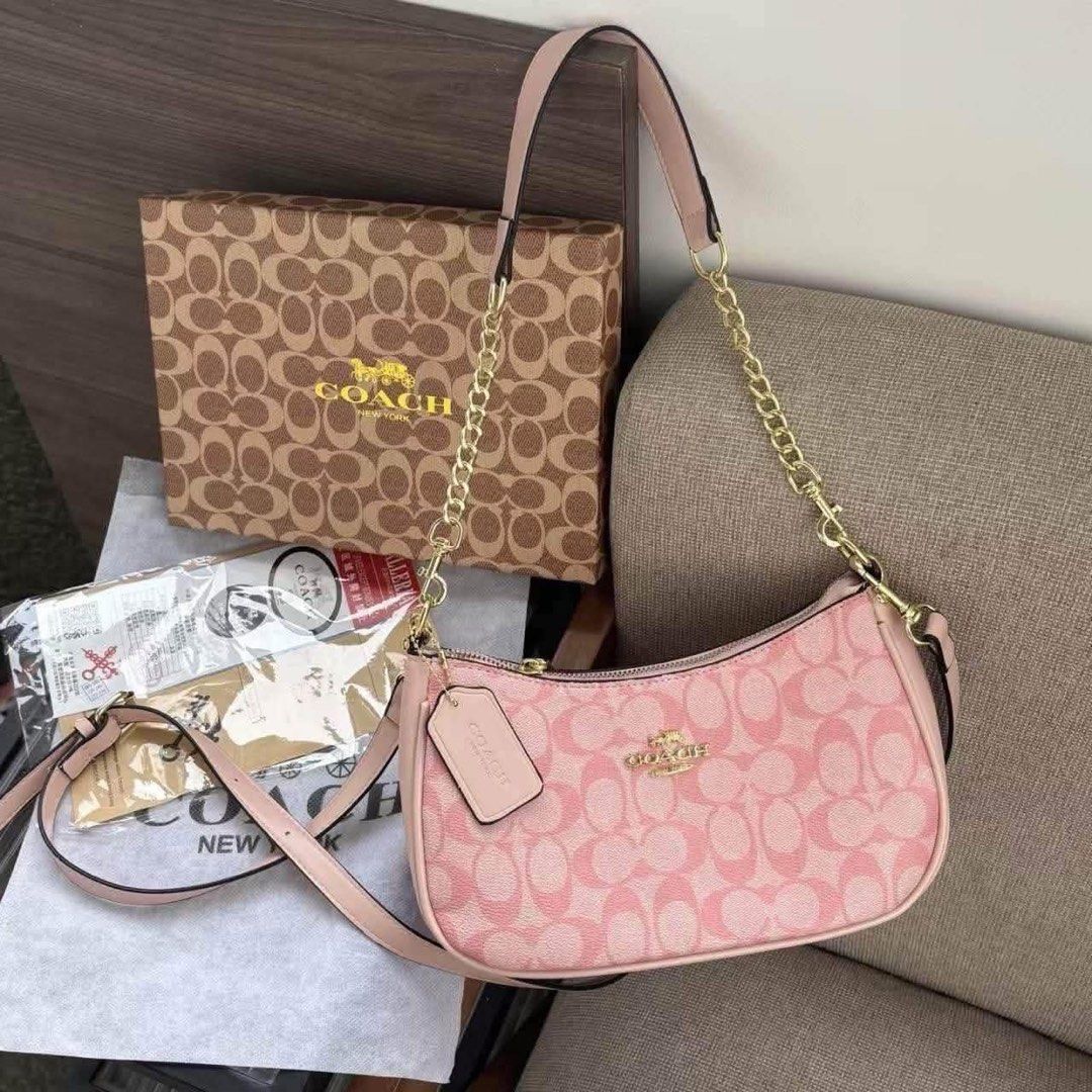 Coach Teri Shoulder Bag (Category: Shoulder Bags) located in Quezon City. Submitted by stuffs.hellyy (Listing ID 1463295202, Image 2). Description: with box.