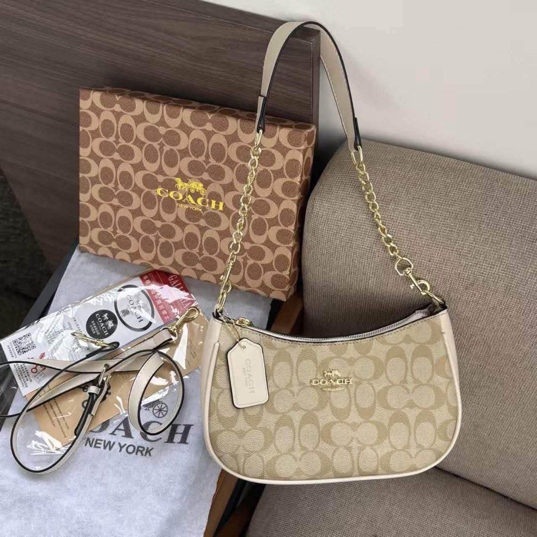 Coach Teri Shoulder Bag (Category: Shoulder Bags) located in Quezon City. Submitted by stuffs.hellyy (Listing ID 1463295202, Image 3). Description: with box.