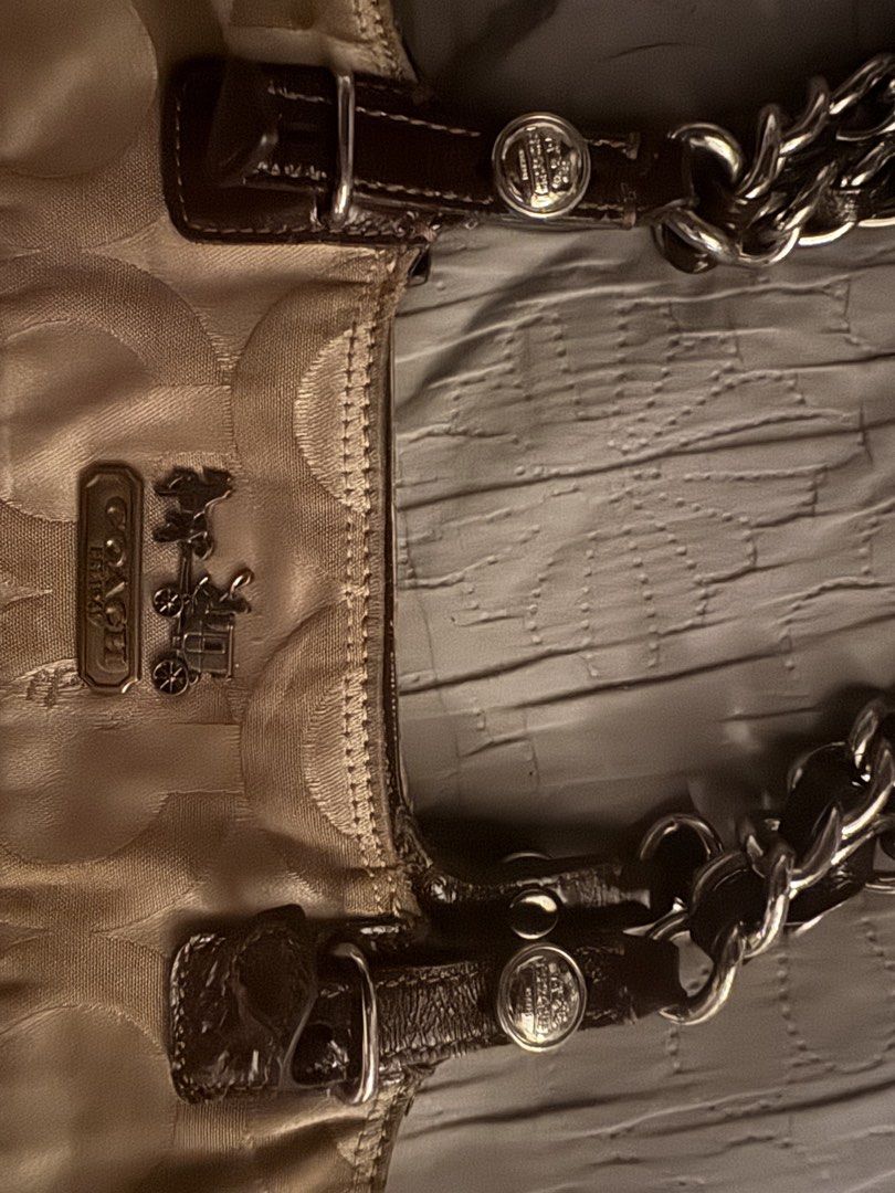 Coach Madison Tote (Category: Luxury Bags & Wallets) located in Pasig City. Submitted by winnerva (Listing ID 1463236324, Image 3). Description: Vintage Coach Madison Tribeca Tote Bag in Sateen - Leather is intact and okay - Bag does not have any major flaws and problems. -Zippers are working Issues: Minimal issues, If ever, pen-marks and small scratches. (OPEN FOR TRADE) For more details please DM RFS: The style does not suit me.