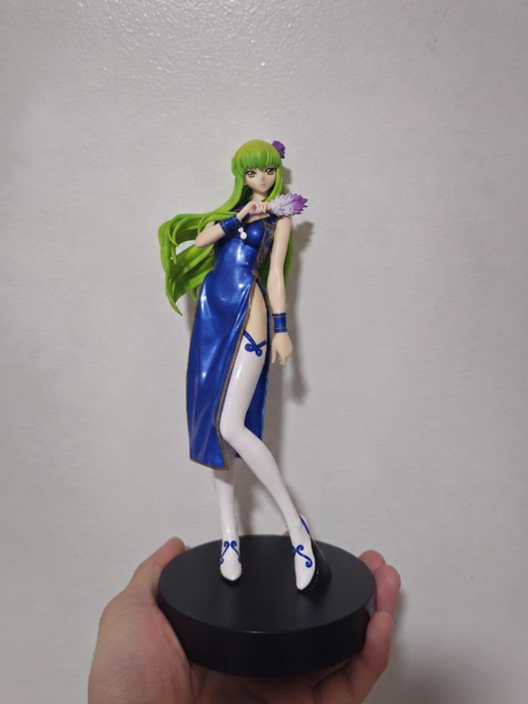 Code Geass C.C. Figure Blue Cheongsam (Category: Figurines & Statues) located in Quezon City. Submitted by louisaninang (Listing ID 1463167374, Image 1). Description: - Code Geass C.C. figure - Features a striking blue cheongsam with thigh-high slits - Comes with a black display base - Ideal for collectors - Please note: Original box is not included.