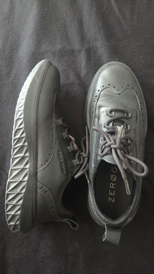 Cole Haan Zero Grand WFA (Category: Dress Shoes) located in Mandaluyong City. Submitted by jeffyboy_123 (Listing ID 1463281055, Image 3). Description: - Cole Haan Zerogrand Oxford Shoes - Color: Black Leather - Style: Lace-up - Features: Comfortable and stylish - Ideal for: Work or casual wear - Condition: Good, with minor creasing on leather. Soles in good shape. Worn just a few times. - Size: 8 (US Mens) But fits 8.5-9 US - With Original Box an