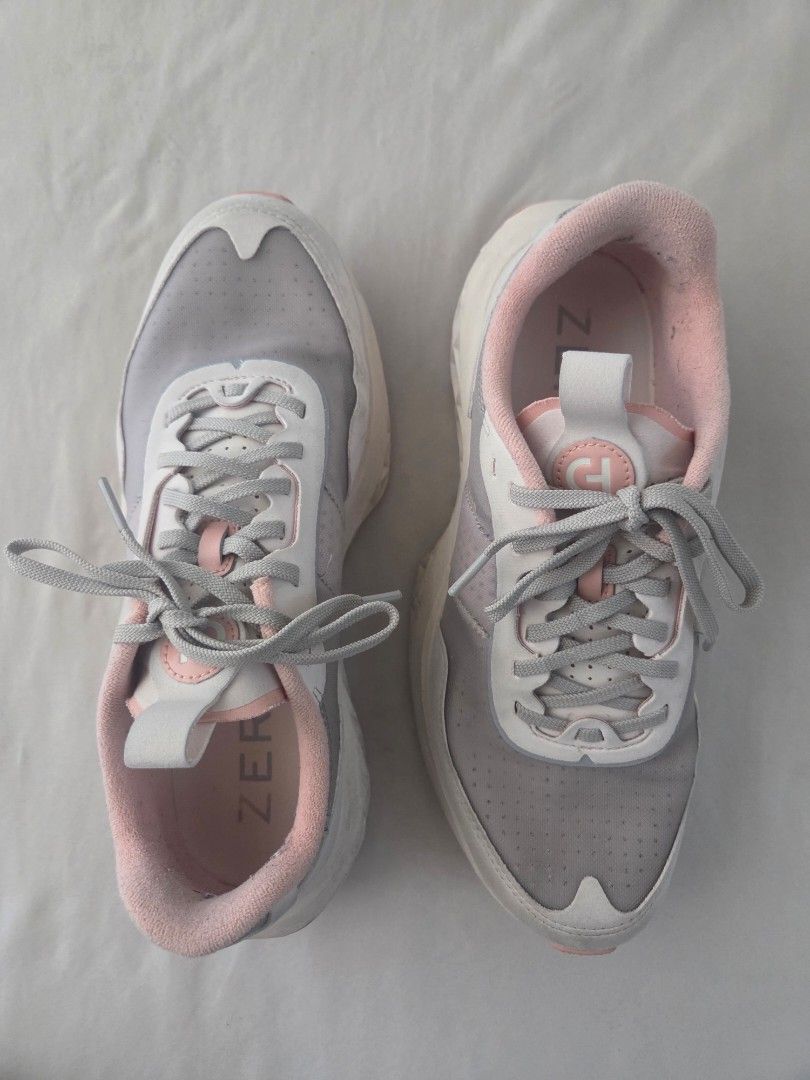 Cole Haan Zerogrand Outpace III (Category: Sneakers) located in Mandaluyong City. Submitted by jeffyboy_123 (Listing ID 1463283243, Image 2). Description: - Cole Haan Zerogrand Sneakers - Colorway: Grey, White, and Pink - Style: Lace-up - Features: Comfortable and stylish for everyday wear - Size: 8.5 (US Mens) But fits 8.5-9 US Mens - With original box and in good condition.
