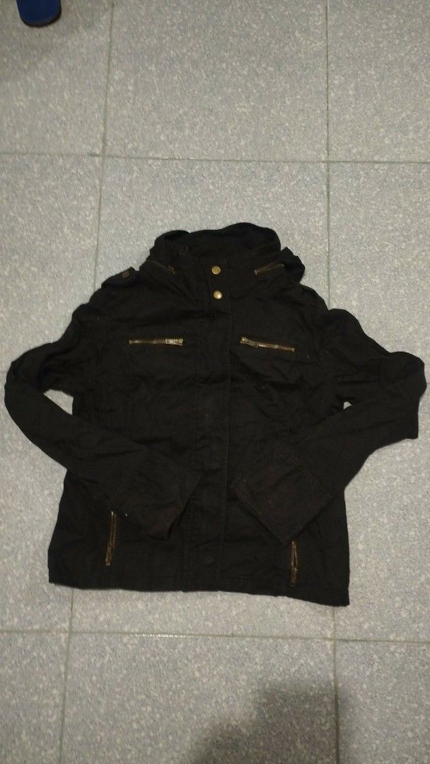 COLZA Black Utility jacket (Category: Coats, Jackets and Outerwear) located in Manila. Submitted by redwolfe.2123 (Listing ID 1463291887, Image 1). Description: - Black utility jacket - Features a hood - Multiple zip pockets on front and sides - Button closure at the front - Ideal for casual wear.