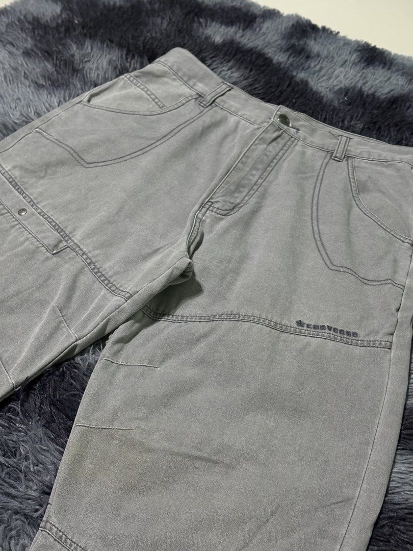 Converse Grey Cargo Pants (Category: Joggers) located in Bulacan. Submitted by luck_finds (Listing ID 1463133810, Image 3). Description: - Grey Converse cargo pants - Durable denim material - Multiple pockets for convenience - Unique adjustable ankle straps with button closure - Ideal for a casual streetwear style - Attention to detail on buttons and stitching.