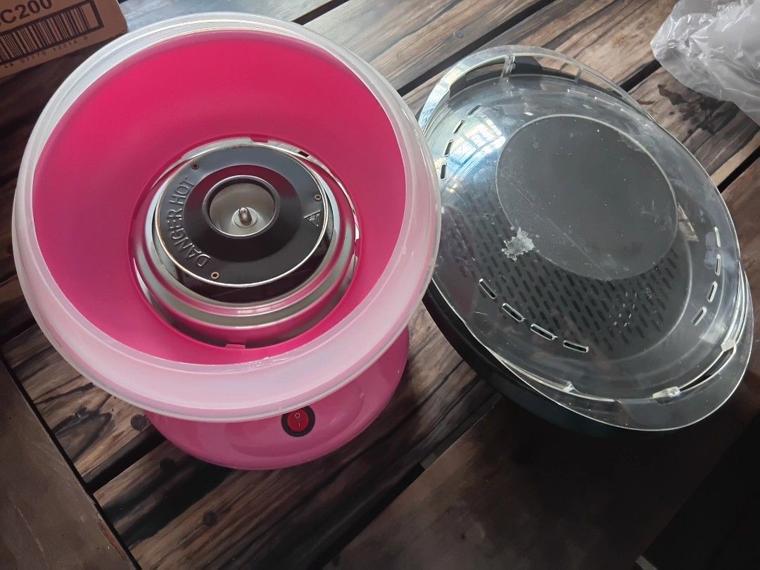 Cotton candy maker + free steaming tray (Category: Other Kitchen Appliances) located in Paranaque City. Submitted by sansa_2022 (Listing ID 1463180695, Image 1). Description: Works perfectly. Only tried it once for testing..
