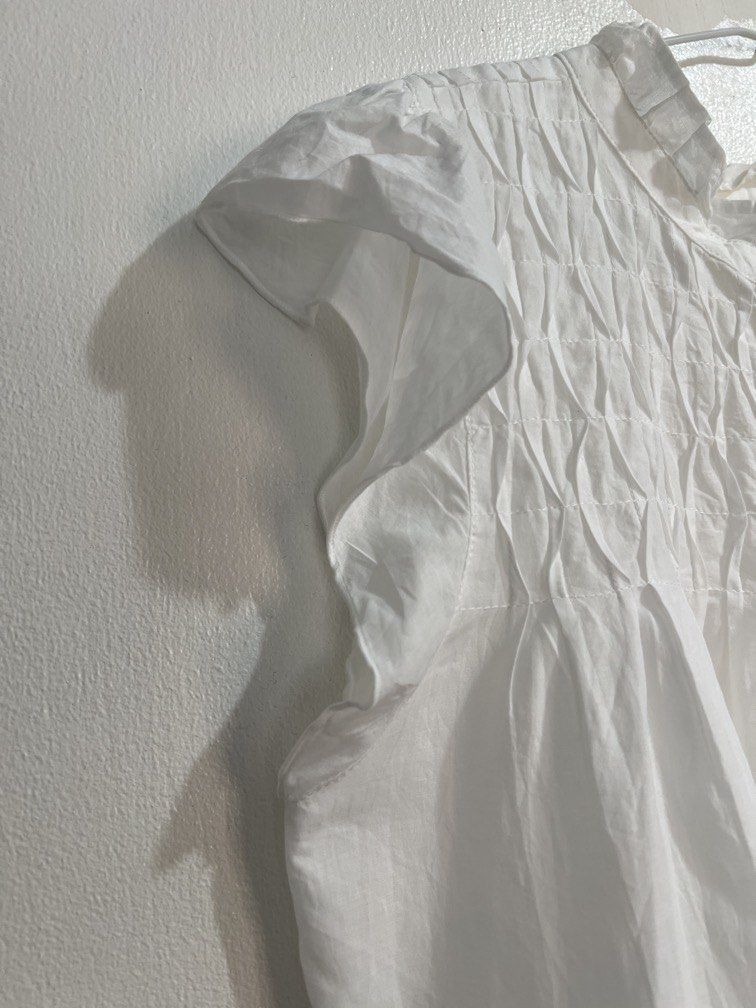 Couture brooch cotton white blouse (Category: Blouses) located in Las Pinas. Submitted by gaeley (Listing ID 1463131234, Image 3). Description: super pretty Zara vibe b: 21" armpit to armpit l: 23".