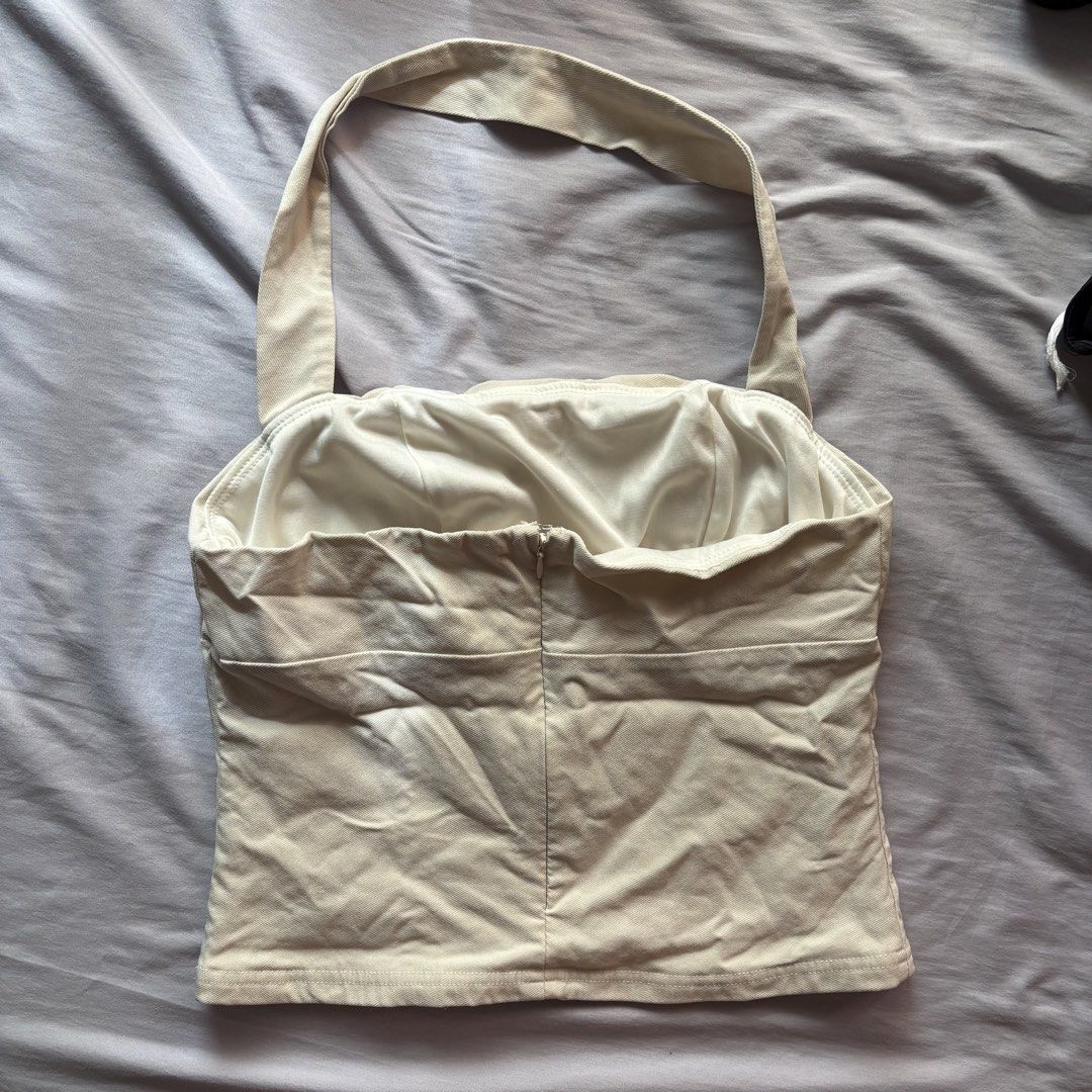 Cream Halter Top (Category: Others Tops) located in Pasig City. Submitted by ariesarchive (Listing ID 1463280878, Image 2). Description: Cream Halter Top 🔖 Used 4x only 🖇️ Php 200 only 🖇️ Size S but can fit Medium - Semi Large RFS: decluttering :-) 📦: SDD via Grab, Angkas, MoveIt for MM only .