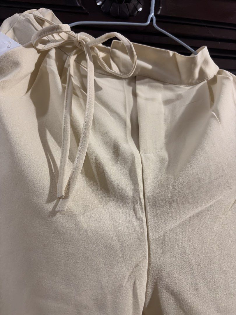 Cream Wide Leg Trouser with Drawstring Waist (Category: Other Bottoms) located in Manila. Submitted by trish.enna (Listing ID 1463233139, Image 3). Description: - Size: Can fit to S/M/L Waistline: 28-33 inches Length: 38 inches - Color: Cream.