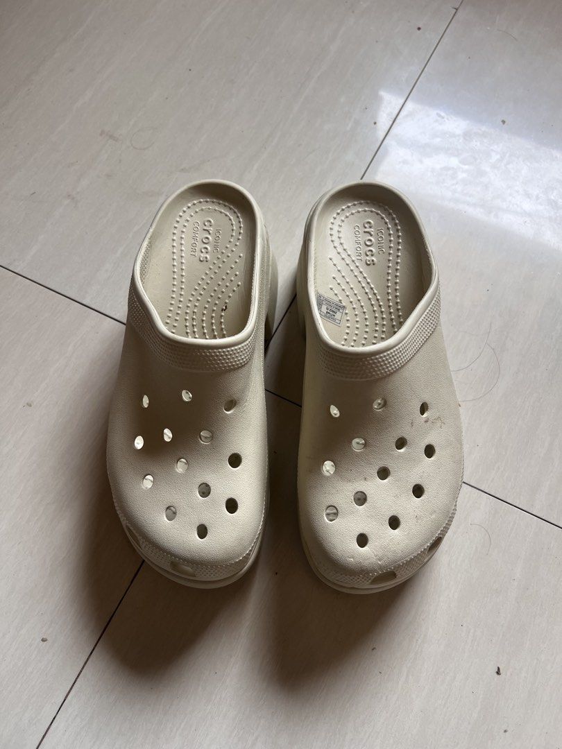 Crocs Platform Clogs Beige Size 7/9 (Category: Slippers and slides) located in Zamboanga. Submitted by safe.haimer (Listing ID 1463229239, Image 1). Description: - Beige Crocs platform clogs - Size: M7/W9 (250/25) - Made in Vietnam - Platform style for added height - Easy slip-on design - Ideal for casual wear.