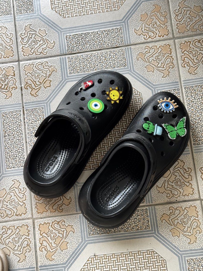 Crocs platform with Assorted Jibbitz Charms - Black & Cream (Category: Slippers and slides) located in Marikina City. Submitted by daintyaesthetics (Listing ID 1463138525, Image 1). Description: 1,800 EACH or 3k for both - Bundle Deal: Get both black and cream Crocs! - Size: M4/W6 for both pairs - Black Crocs with fun Jibbitz (eyes, sun, butterflies, etc.) - Cream Crocs with fun Jibbitz (eyes, sun, butterflies, etc.) - Perfect for casual wear and