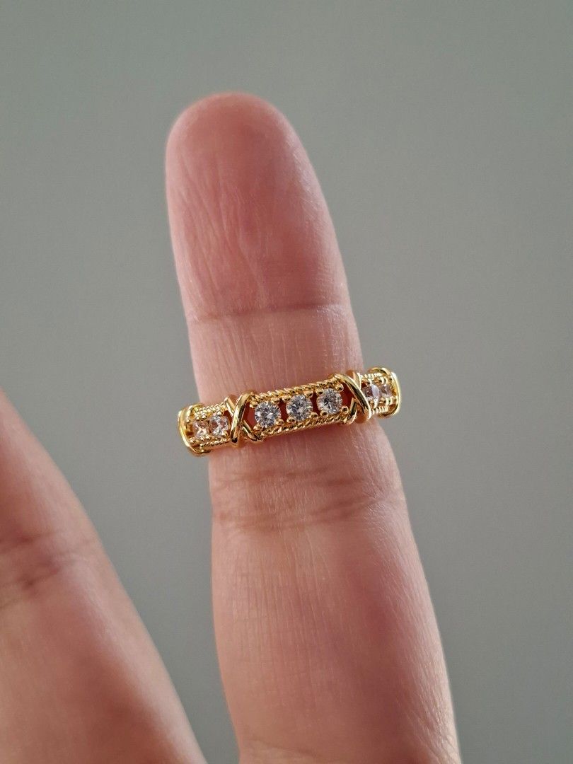 Cross and Stones Gold Adjustable Ring (Category: Rings) located in Dasmarinas. Submitted by danabrie22 (Listing ID 1463234488, Image 1). Description: adjustable size 5 - 9 very well-made, excellent crafstmanship 10/10 condition brand new stainless steel & white crystal-colored cubic zirconia stones made in Hongkong.