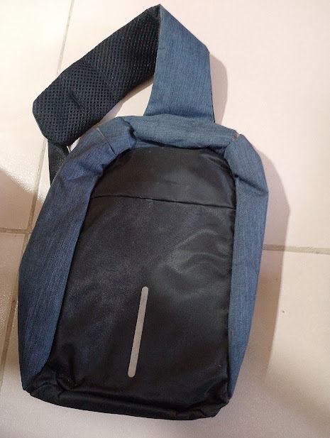 Dark Blue Sling Bag with Mesh Back (Category: Sling Bags) located in Quezon City. Submitted by susmaryosep1 (Listing ID 1463256532, Image 1). Description: - Dark blue sling bag - Padded mesh back for comfort - Adjustable strap - Ideal for everyday use -Used 300 pesos .
