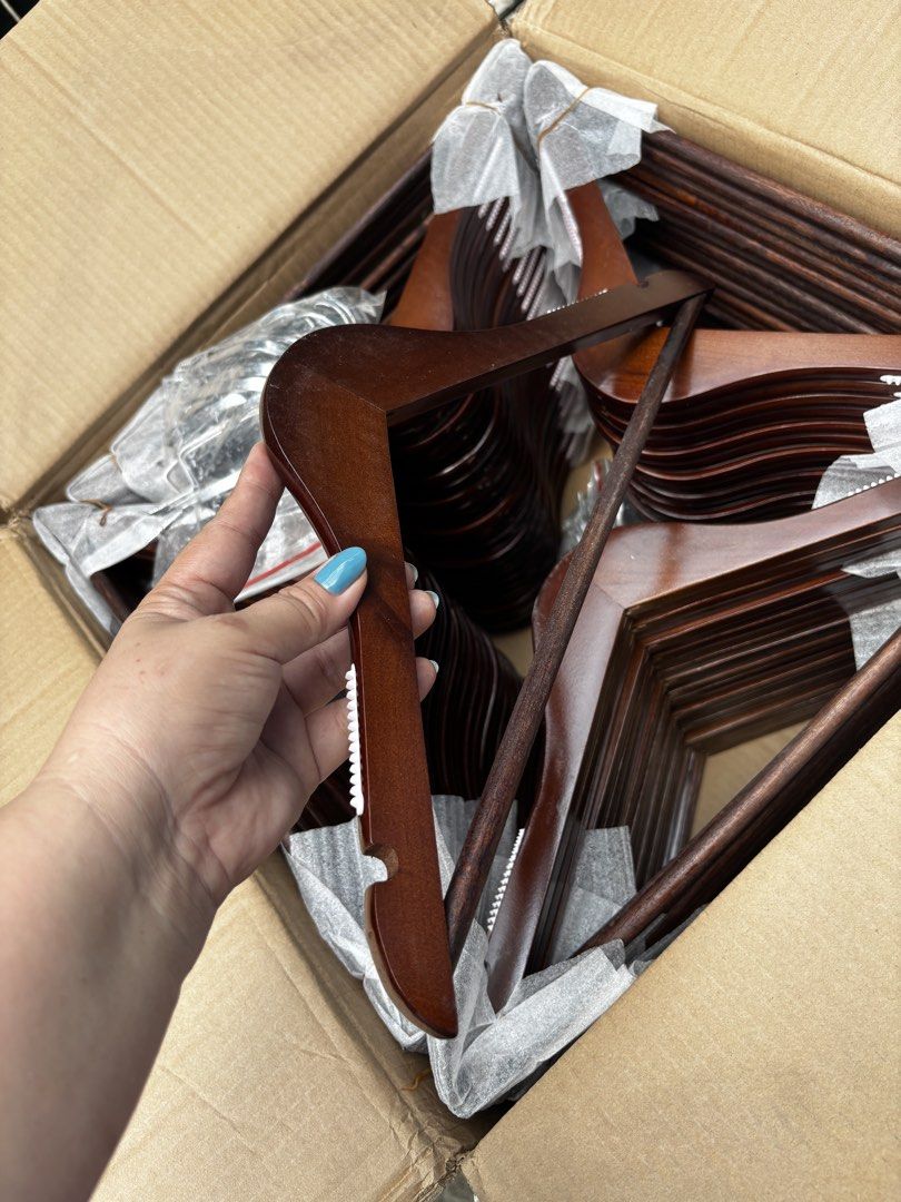Dark brown Wooden hanger solid heavy duty (Category: Hooks & Hangers) located in Manila. Submitted by shelvingstoreandmore (Listing ID 1463324326, Image 1). Description: Wholesale price only sold per box(100pcs) 100PCS FOR ₱2,000-1box This is all brandnew fresh from our importer/manufacturer .