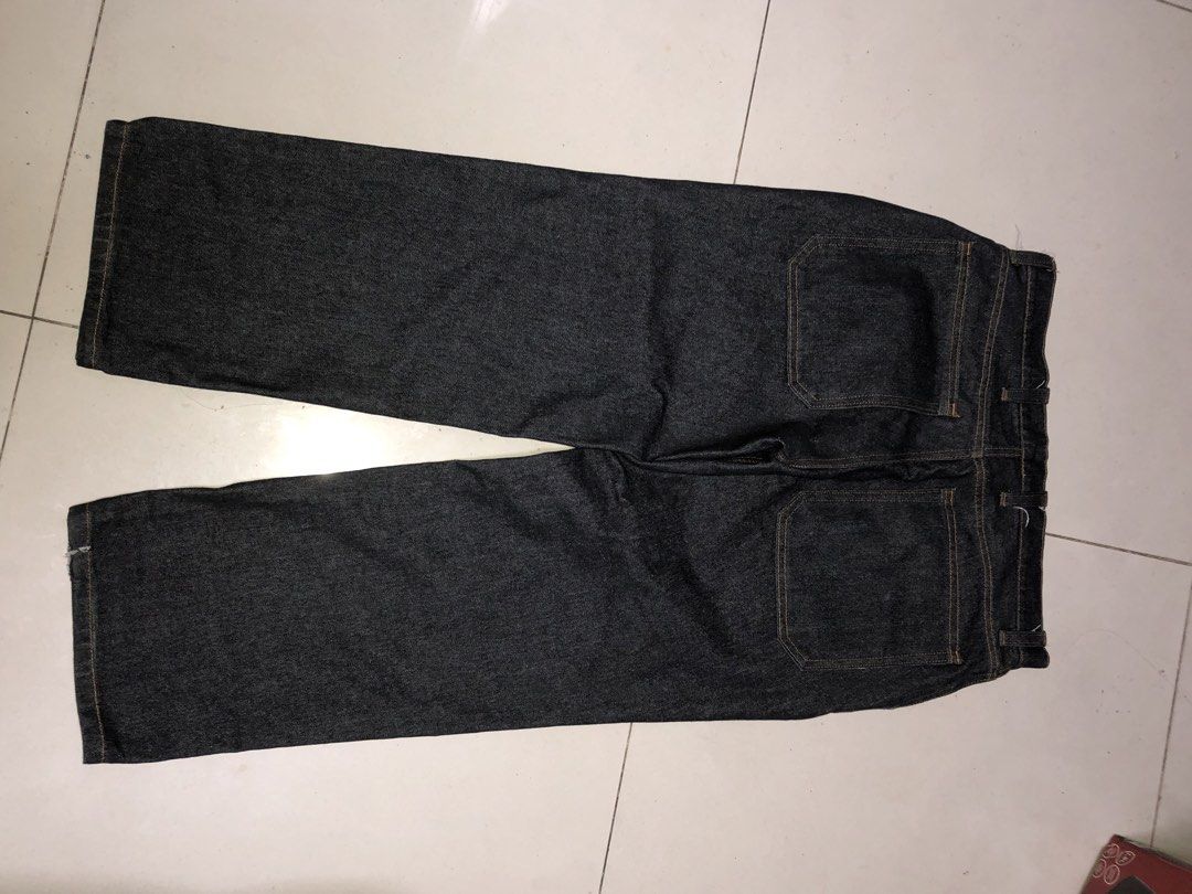 Dark Wash Denim Jeans (Category: Jeans) located in Quezon City. Submitted by jdeealvrz (Listing ID 1463291196, Image 3). Description: - Classic dark wash denim - Straight leg cut - Two back pockets with stitching detail - Button and zip closure - Versatile for everyday, casual, or dressed-up outfits.
