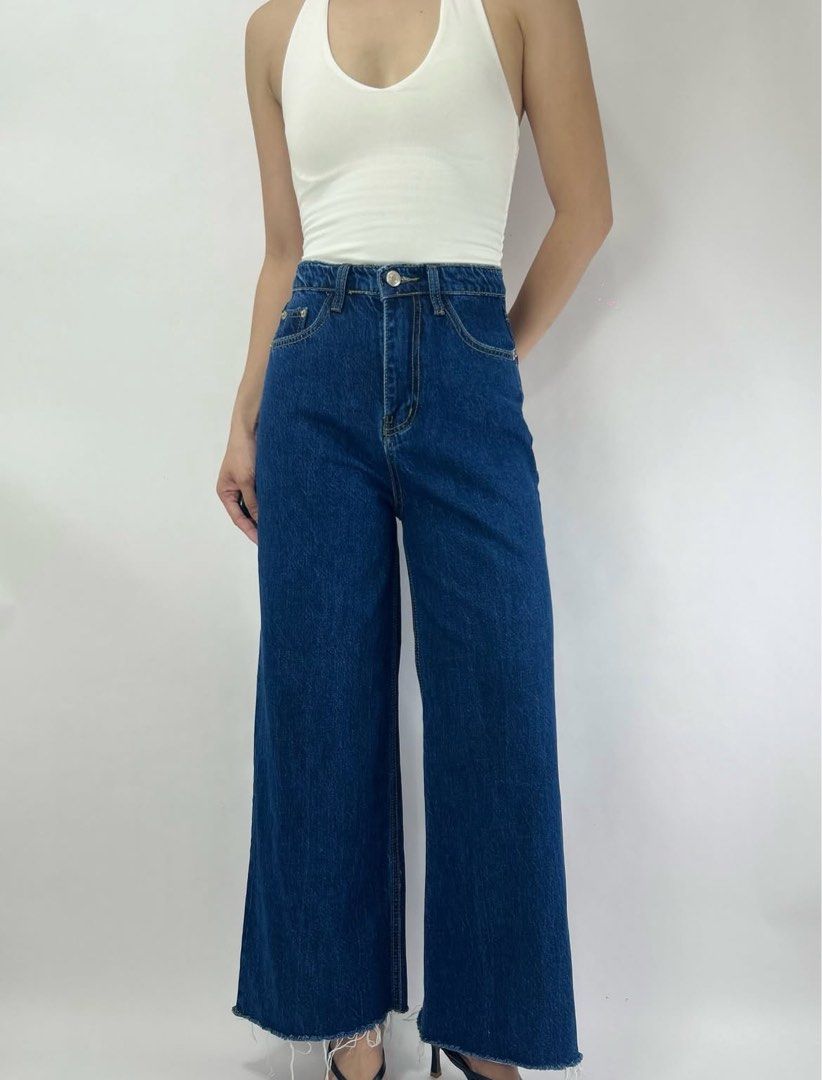 Dark washed wide leg jeans (Category: Jeans) located in Tacloban City. Submitted by homeresmik34297 (Listing ID 1463325070, Image 2). Description: Waist: 25" Rise: 12" Hips: 37" Length: 38".