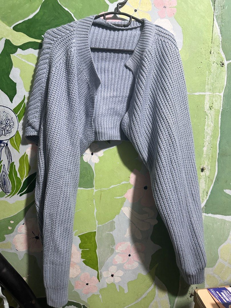 Dazy Blue Knit Cropped Cardigan (Category: Coats, Jackets and Outerwear) located in Manila. Submitted by edgiedge (Listing ID 1463270471, Image 2). Description: Light blue Dazy cropped cardigan, 100% acrylic, chunky knit with balloon sleeves. Brand new with tags, bought from Shein. ₱200 TONDO.
