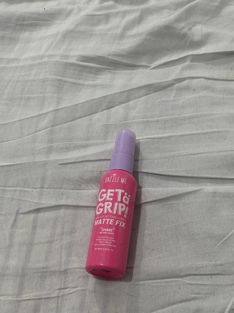 Dazzle Me Get Grip! Matte Fix Makeup Setting Spray (Category: Makeup) located in Echague. Submitted by randomstuffofk (Listing ID 1463205290, Image 1). Description: - Achieve a 24-hour matte finish with Dazzle Me Matte Fix Setting Spray. - Powerful oil control for a shine-free complexion. - Triple-proof formula for long-lasting wear. - Hydrates and is kind to your skin. - Shake well before use. - Net Content: 60ml / 2.03 Fl. Oz..