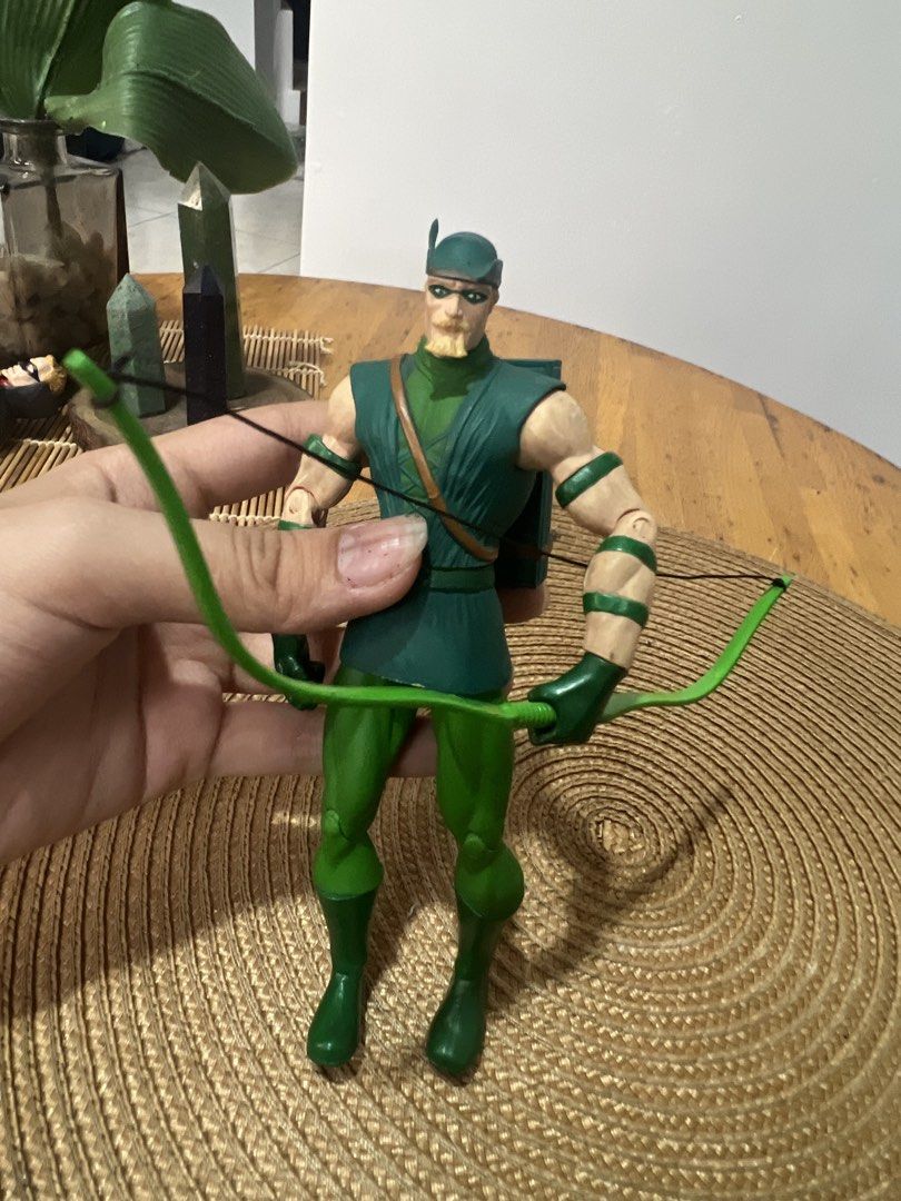 DC Comics Green Arrow Action Figure with Bow (Category: Figurines & Statues) located in Bocaue. Submitted by kwon_017 (Listing ID 1463122693, Image 1). Description: - good condition, needs cleaning sa bandang lalagyan ng arrows - missing arrows and stand - Green Arrow action figure - Includes signature bow and quiver - Poseable limbs for dynamic display - Ideal for DC Comics fans and collectors - Classic representation of the Emerald Archer.