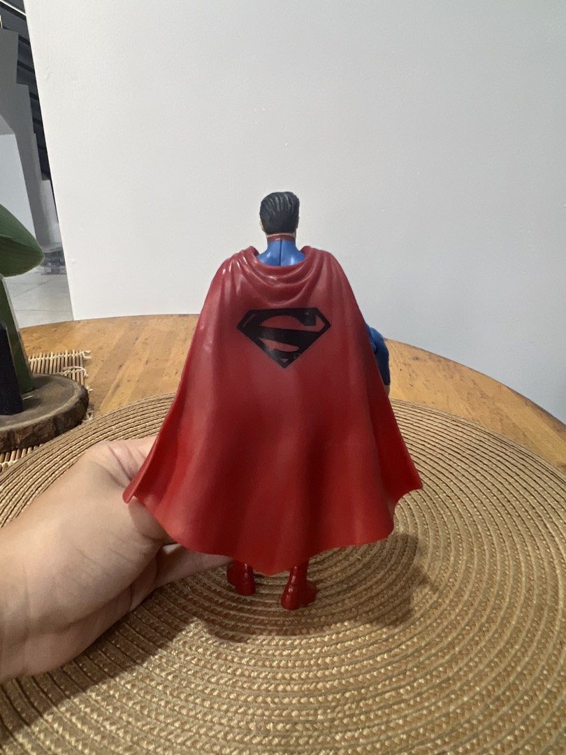 DC Comics Superman Action Figure (Category: Figurines & Statues) located in Bocaue. Submitted by kwon_017 (Listing ID 1463123228, Image 3). Description: - good condition, needs cleaning - missing stand - Classic Superman action figure - Blue suit with red cape and boots - Iconic 'S' shield on chest and back - Poseable limbs for display - Great for collectors or fans of the Man of Steel.