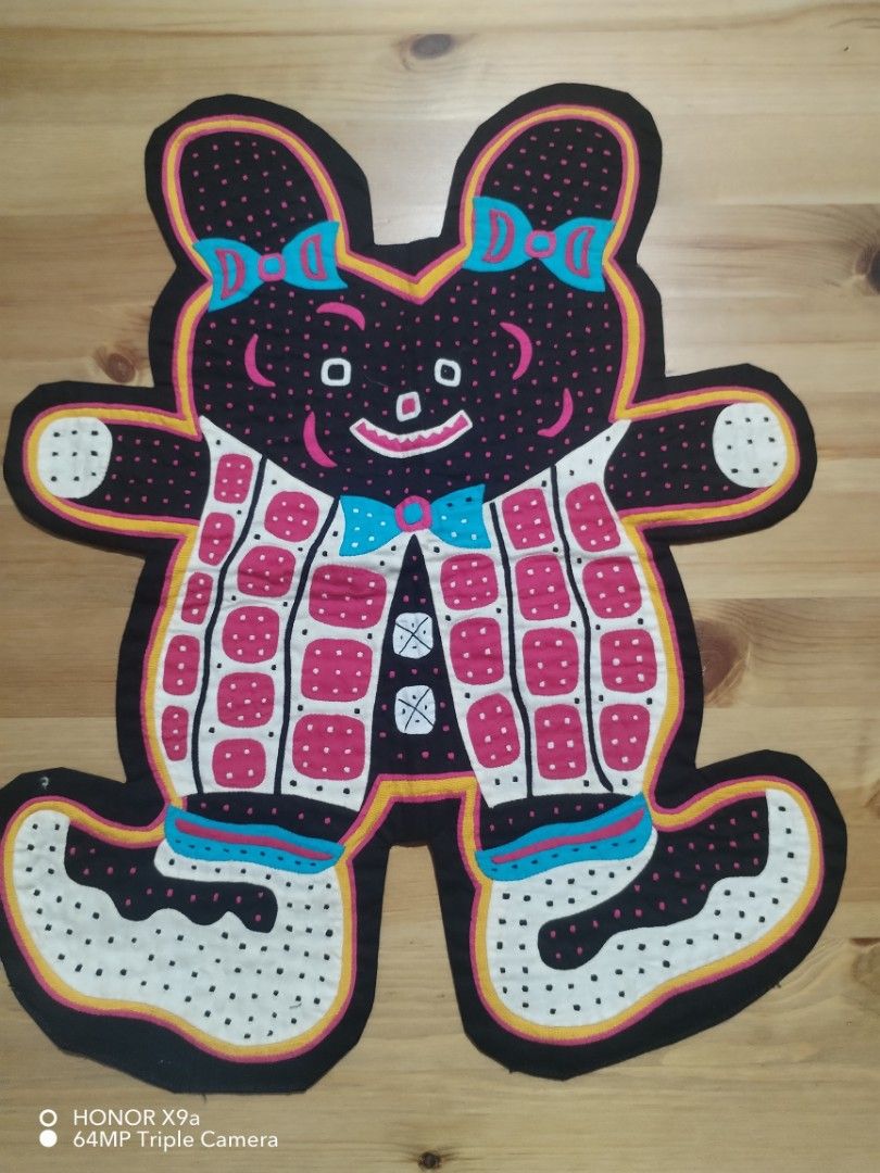 Decor (Category: Other Home Decor) located in Muntinlupa City. Submitted by arciagamaryann68 (Listing ID 1463316008, Image 2). Description: - Adorable teddy bear shaped decor piece. - Features a vibrant and playful design with pink, blue, and white polka dots. - Charming details include bows and a patterned vest. - Adds a fun and whimsical touch to any space. - Ideal for children's rooms, parties, or general decoration..