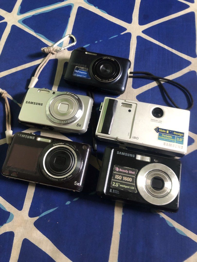 Defective Samsung Digital Cameras bundle (Category: Cameras) located in Quezon City. Submitted by markgolveo (Listing ID 1463142297, Image 2). Description: Defective Samsung Digital Cameras bundle No set breaking Untested units Declaring as defectives for parts out repairs For display or collection purposes No batteries units only.