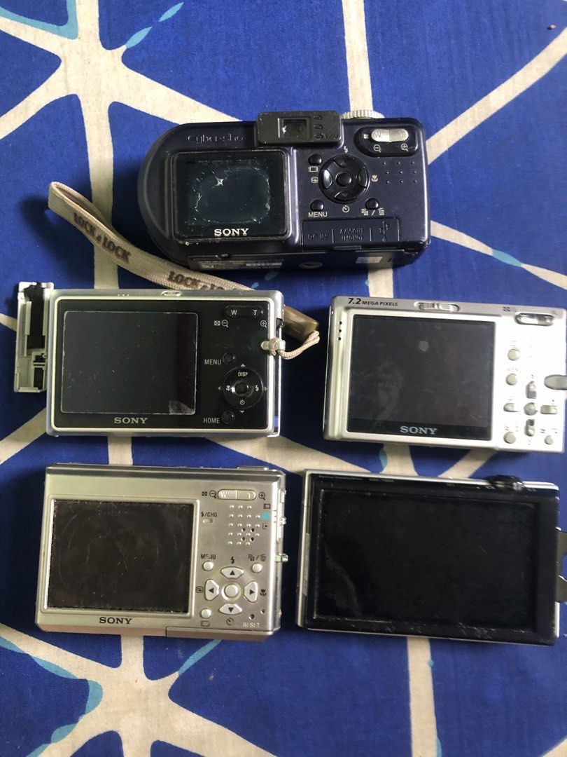 Defective Sony Cybershot Digicam bundle (Category: Cameras) located in Quezon City. Submitted by markgolveo (Listing ID 1463141332, Image 2). Description: Defective Sony Cybershot Digicam bundle Untested units Signs of heavy wears as shown No batteries Defectives for repairs parts out For display or collections No set breaking.