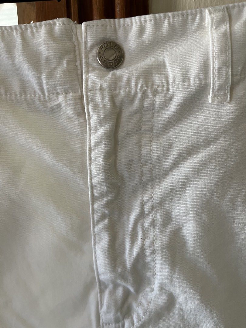 Denim skirt white (Category: Other Bottoms) located in Bacoor. Submitted by ayit. (Listing ID 1463158139, Image 2). Description: 14.5/35 dimes Personal jpan. Gling no issue sf inc - Brand: Polo Sport - Color: White - Size: Medium (US 26 / UK 10 / EU 38) - Style: Denim skirt with cargo pockets - Condition: 4/5 (Good) - Features: Classic Polo Sport branding, durable denim material.