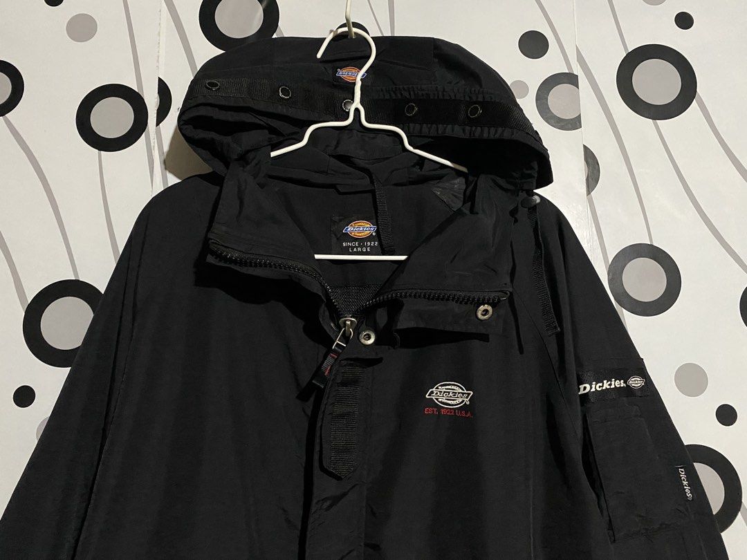 Dickies WindBreaker (Category: Coats, Jackets and Outerwear) located in Cebu City. Submitted by patspickph (Listing ID 1463265344, Image 3). Description: This is a black Dickies hooded windbreaker jacket featuring embroidered chest logo detailing and a utility sleeve pocket. Dickies Logo all over😍 Size Large on tag W24 L30. No issue Excellent Condition👍👌.