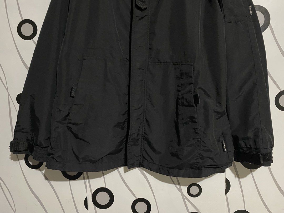 Dickies WindBreaker (Category: Coats, Jackets and Outerwear) located in Cebu City. Submitted by patspickph (Listing ID 1463265344, Image 2). Description: This is a black Dickies hooded windbreaker jacket featuring embroidered chest logo detailing and a utility sleeve pocket. Dickies Logo all over😍 Size Large on tag W24 L30. No issue Excellent Condition👍👌.