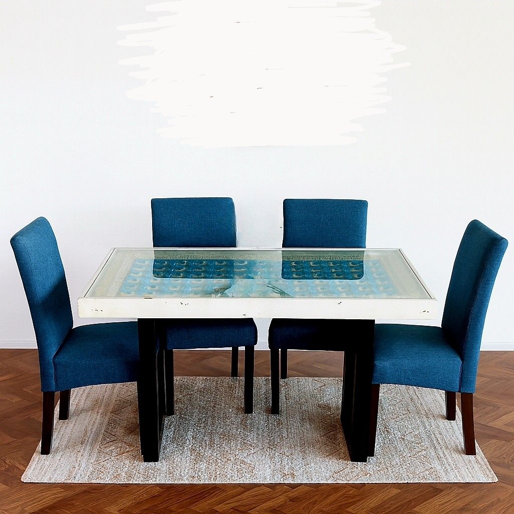 Dining table (Category: Tables & Sets) located in Singapore. Submitted by rainie1717 (Listing ID 1463125900, Image 3). Description: Hand Carved Wooden Dining Table This dining table brings together charm and functionality with a beautiful blue and white-washed finish, sturdy iron legs, and a clear glass top that completes the look. Material Composition Mango Wood, Iron & Glass Dimensions L 150 × W 90 × H 76 cm Finish White and Blue Washed.
