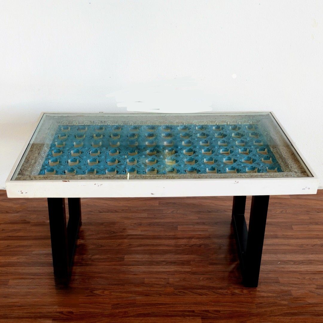 Dining table (Category: Tables & Sets) located in Singapore. Submitted by rainie1717 (Listing ID 1463125900, Image 1). Description: Hand Carved Wooden Dining Table This dining table brings together charm and functionality with a beautiful blue and white-washed finish, sturdy iron legs, and a clear glass top that completes the look. Material Composition Mango Wood, Iron & Glass Dimensions L 150 × W 90 × H 76 cm Finish White and Blue Washed.