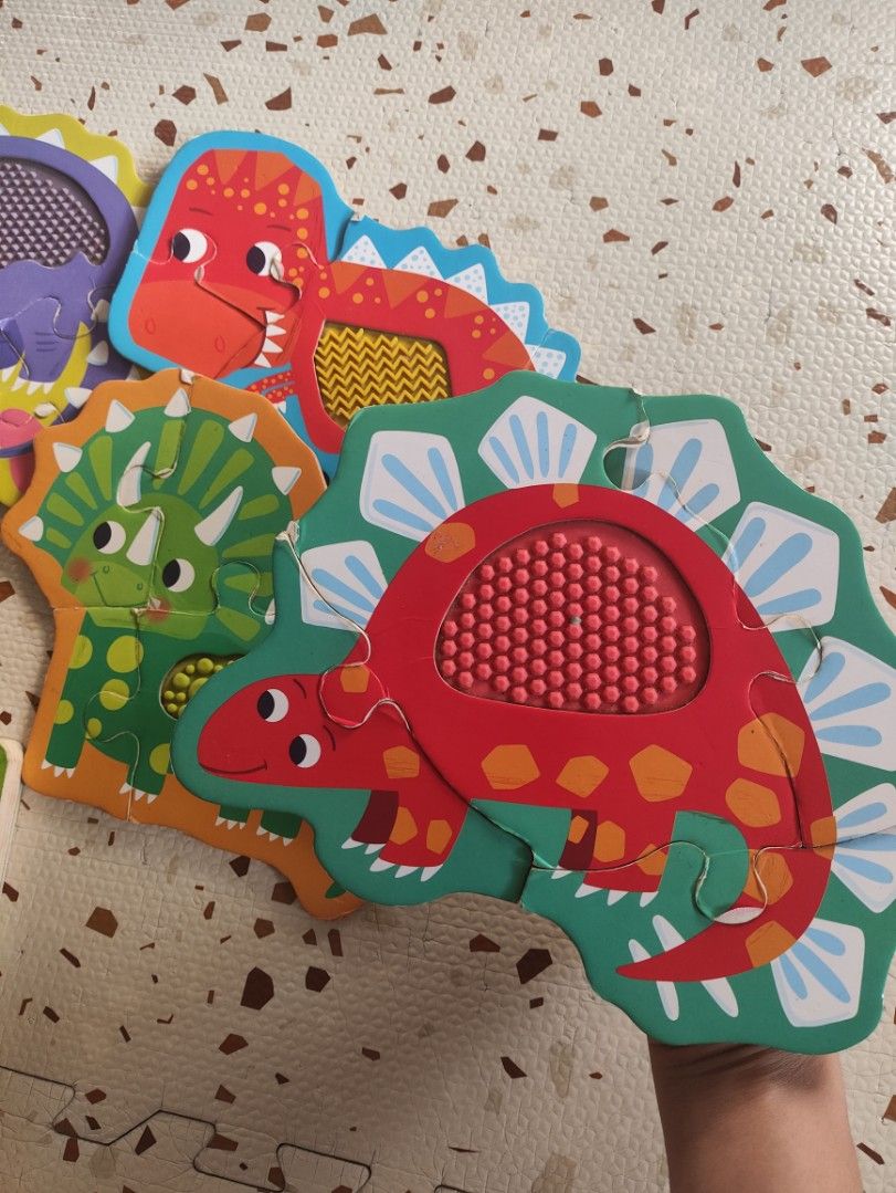 Dinosaur Puzzle Set with Boardbook 🦖❤️ (Category: Infant Playtime) located in Taguig. Submitted by cleanupmomma (Listing ID 1463203636, Image 2). Description: Please take time to read ❤️ 🌟Rare Sold as Set Big Chunky Puzzle for babies/toddlers My son loved it so much when hes 3-4 yrs old with sensory each puzzle piece wyiwyg.