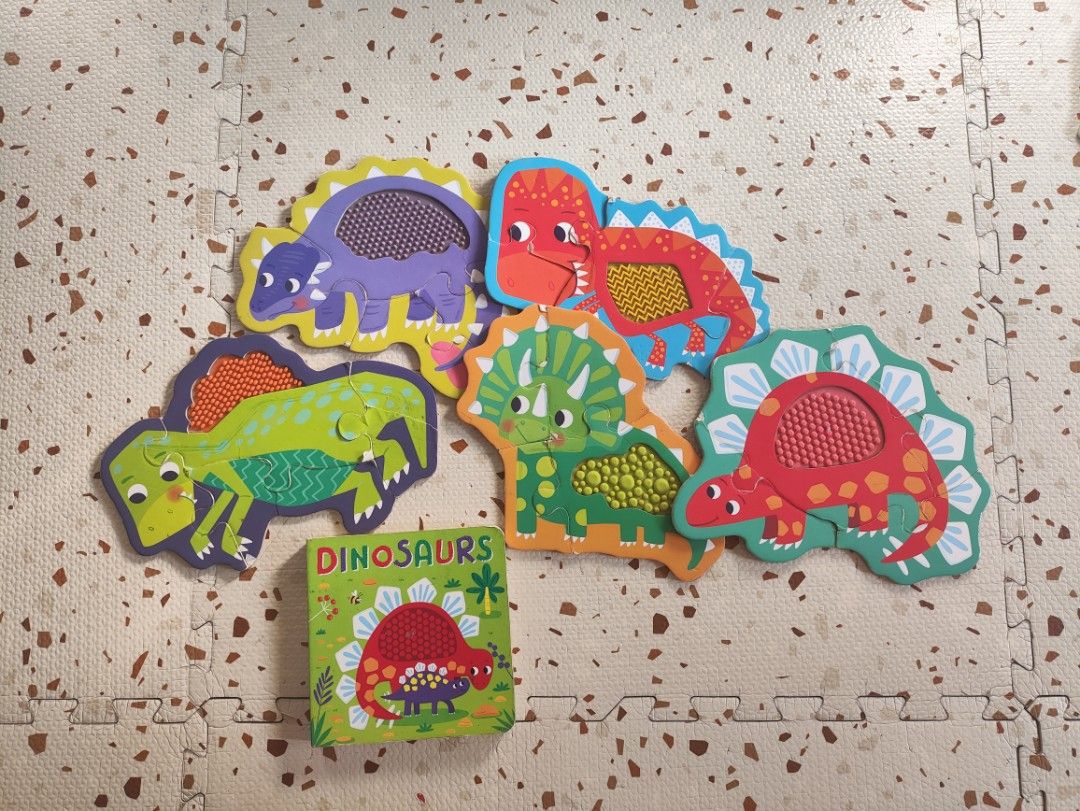 Dinosaur Puzzle Set with Boardbook 🦖❤️ (Category: Infant Playtime) located in Taguig. Submitted by cleanupmomma (Listing ID 1463203636, Image 1). Description: Please take time to read ❤️ 🌟Rare Sold as Set Big Chunky Puzzle for babies/toddlers My son loved it so much when hes 3-4 yrs old with sensory each puzzle piece wyiwyg.