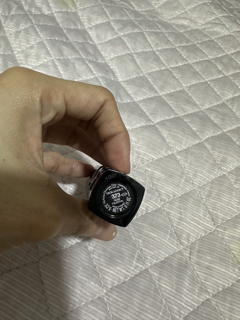 Dior Addict Lipstick 373 Celestial (Category: Makeup) located in Pasay City. Submitted by jan_0828 (Listing ID 1463125142, Image 3). Description: - Dior Addict Lipstick - Shade: 373 Celestial (lovely pink) - Full-size - Case: Black with silver Dior lettering - Versatile: Great for everyday wear or special occasions.
