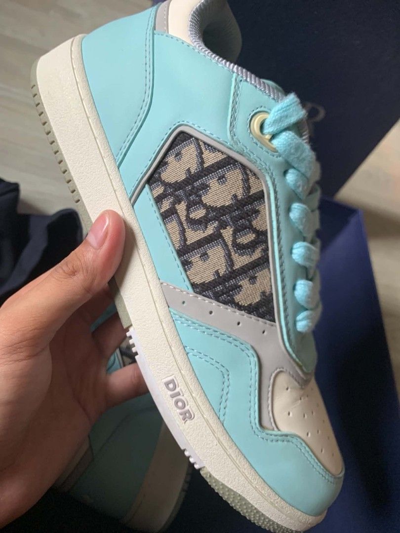 Dior B27 Low Top Sneakers (Category: Sneakers) located in Cainta. Submitted by zepseven7 (Listing ID 1463121196, Image 3). Description: - Dior B23 low top sneakers - Color: Light blue and beige - Features iconic Dior Oblique canvas - Comes with replacement box and ribbon - Made in Italy - Perfect addition to any sneaker collection - DM for the price.
